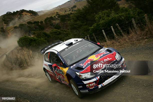 Sebastien Ogier of France and co-driver Julien Ingrassia of France drive their Citroen C4 Junior Team during Leg2 of the WRC Rally of New Zealand on...