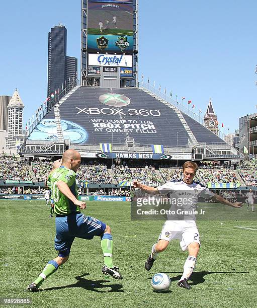 Freddie Ljungberg of the Seattle Sounders FC battles Michael Stephens of the Los Angeles Galaxy on May 8, 2010 at Qwest Field in Seattle, Washington....