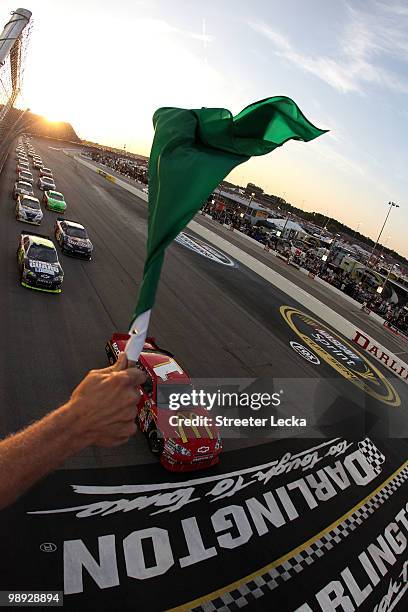 Jamie McMurray, driver of the McDonald's Chevrolet, leads the field at the start of the NASCAR Sprint Cup series SHOWTIME Southern 500 at Darlington...