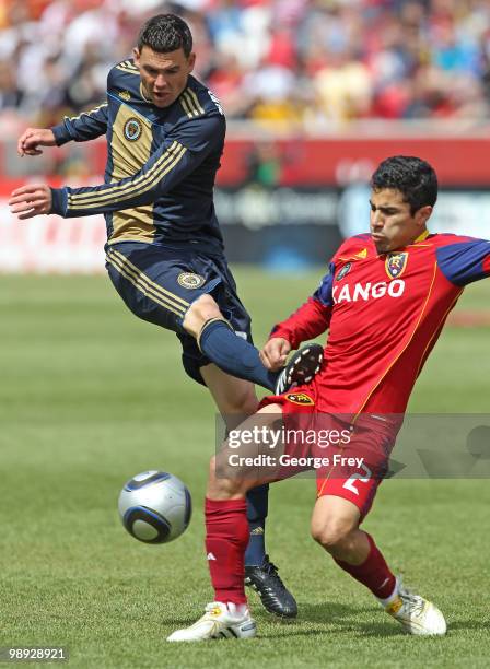 Nick Zimmerman of Philadelphia Union kicks Tony Beltran of Real Salt Lake during the second half of an MLS soccer game in Rio Tinto Stadium May 8,...