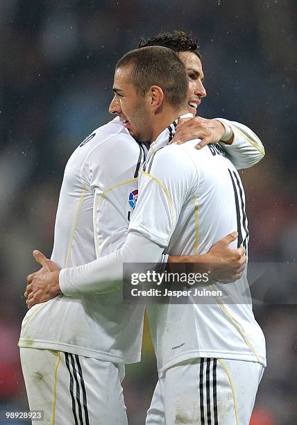 Karim Benzema of Real Madrid celebrates scoring with his teammate Cristiano Ronaldo during the La Liga match between Real Madrid and Athletic Bilbao...