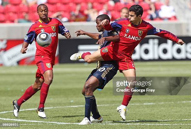Danny Mwanga of Philadelphia Union fights for the ball with Tony Beltran of Real Salt Lake during the second half of an MLS soccer game in Rio Tinto...