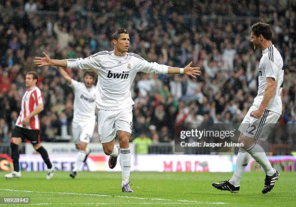 Cristiano Ronaldo of Real Madrid celebrates scoring his sides opening goal from the penalty spot with his teammate Xabi Alonso during the La Liga...