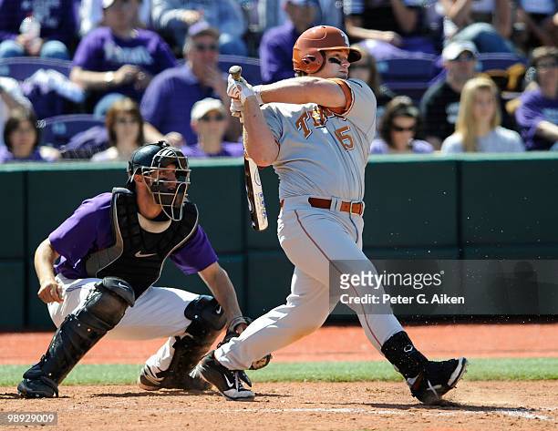 Russell Moldenhauer of the Texas Longhorns drives in a run with a hit during a game against the Kansas State Wildcats at Tointon Stadium on May 8,...