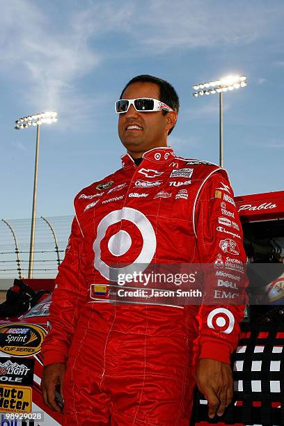 Juan Pablo Montoya, driver of the Target Chevrolet, stands on the grid prior to the start of the NASCAR Sprint Cup series SHOWTIME Southern 500 at...
