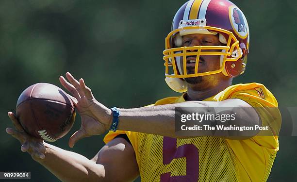 Redskins quarterback Donovan McNabbwarms up during the 2nd day of a mini camp held by the Washington Redskins in Ashburn VA May 8 2010.