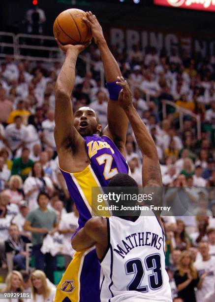 Kobe Bryant of the Los Angeles Lakers shoots over Wesley Matthews of the Utah Jazz during Game Three of the Western Conference Semifinals of the 2010...