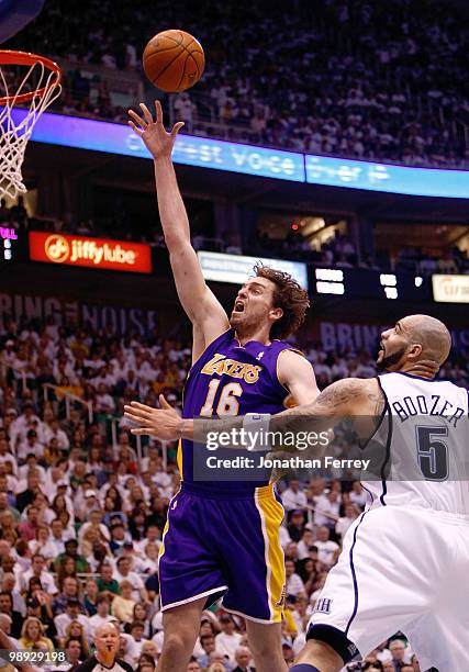 Pau Gasol of the Los Angeles Lakers shoots over Carlos Boozer of the Utah Jazz during Game Three of the Western Conference Semifinals of the 2010 NBA...