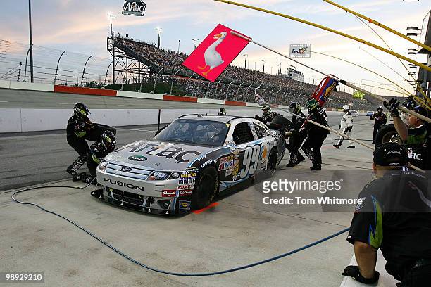 Carl Edwards, driver of the Aflac Ford, pits during the NASCAR Sprint Cup series SHOWTIME Southern 500 at Darlington Raceway on May 8, 2010 in...