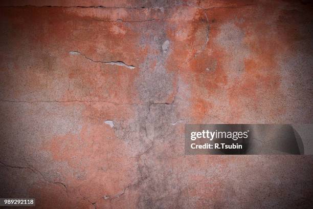dark edged red plaster concrete wall wallpaper background - edged stock pictures, royalty-free photos & images