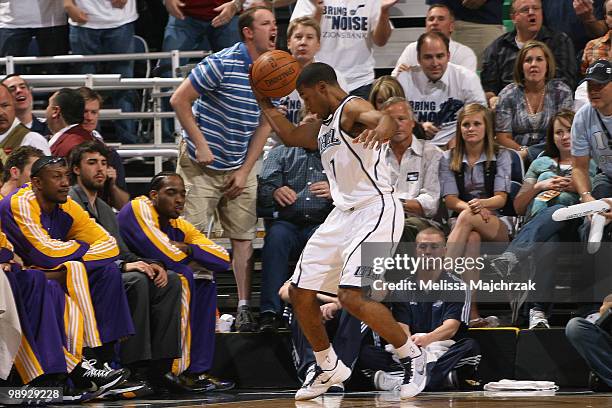 Ronnie Price of the Utah Jazz saves the ball from going out of bounds against the Los Angeles Lakers in Game Three of the Western Conference...