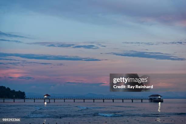 sunset on pulau tiga, borneo - tiga stock pictures, royalty-free photos & images