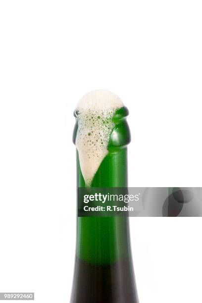 bottle of special dark beer isolated on white, opened - botella de cerveza fotografías e imágenes de stock