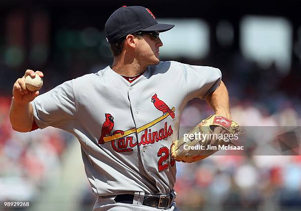 David Freese of the St. Louis Cardinals throws between innings against the Philadelphia Phillies at Citizens Bank Park on May 6, 2010 in...