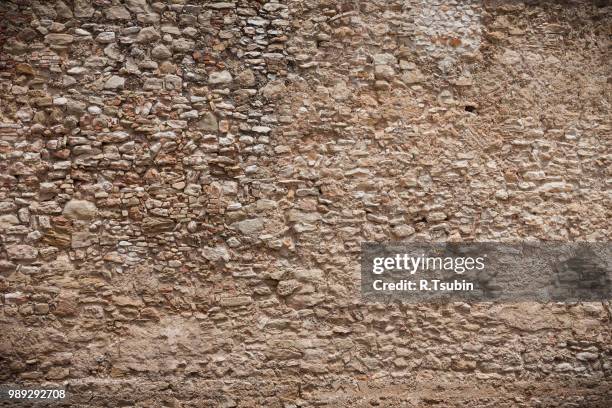 stone made wall texture background. dark edged - edged stock pictures, royalty-free photos & images