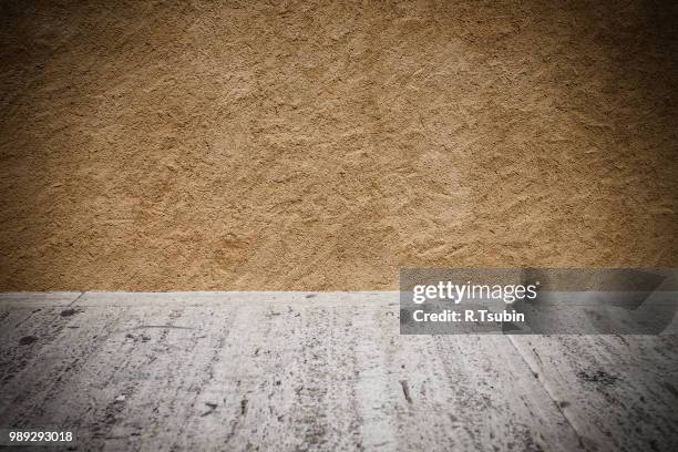 plaster background wall with concrete cement floor. dark edged - edged stock pictures, royalty-free photos & images