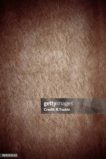 vintage dark brown painted plaster concrete wall background. dark edged - edged stock pictures, royalty-free photos & images