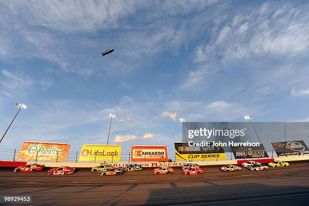 Kasey Kahne, driver of the Budweiser Ford, leads a pack of cars during the NASCAR Sprint Cup series SHOWTIME Southern 500 at Darlington Raceway on...