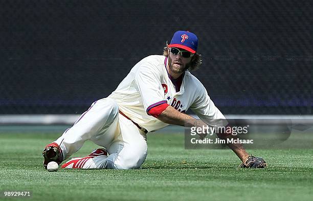 Jayson Werth of the Philadelphia Phillies fields a ball against the St. Louis Cardinals at Citizens Bank Park on May 6, 2010 in Philadelphia,...