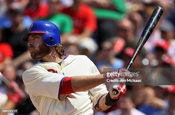 Jayson Werth of the Philadelphia Phillies follows through on a second inning double against the St. Louis Cardinals at Citizens Bank Park on May 6,...