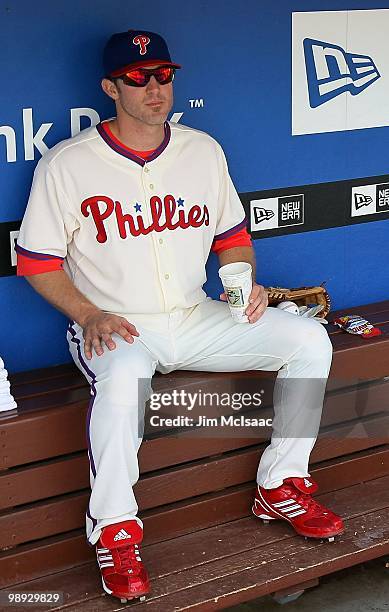 Chase Utley of the Philadelphia Phillies sits in the dugout prior to playing against the St. Louis Cardinals at Citizens Bank Park on May 6, 2010 in...