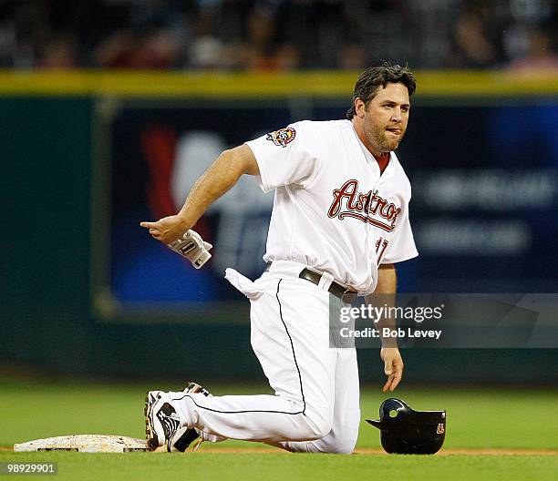 Lance Berkman of the Houston Astros reacts to being called out on the front end of double play against the San Diego Padres at Minute Maid Park on...