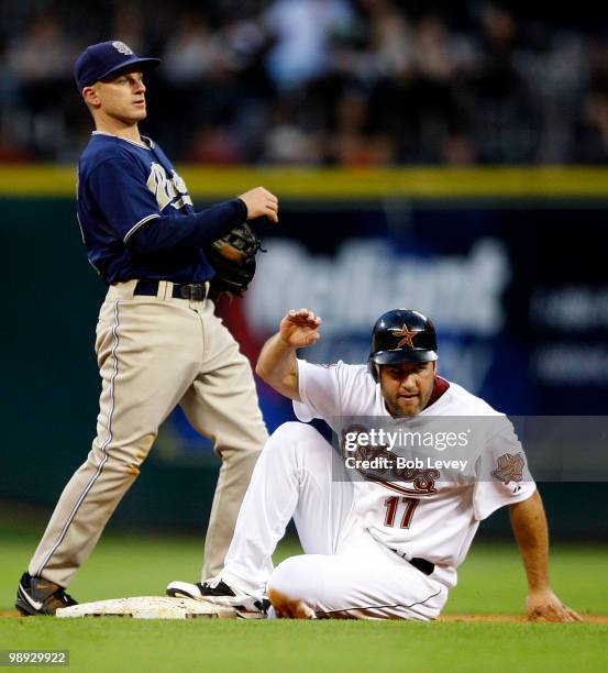 Lance Berkman of the Houston Astros reacts to being called out on the front end of double play against the San Diego Padres' David Eckstein at Minute...