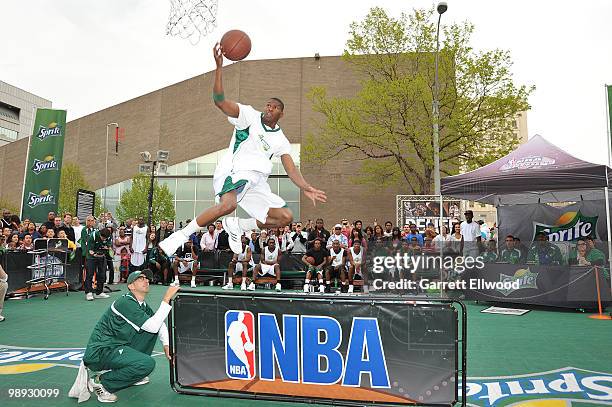 Participant dunks during the Sprite Slam Dunk Contest as part of the NBA Nation Mobile Basketball Tour on May 8, 2010 at the ÒCinco De Mayo Festival"...