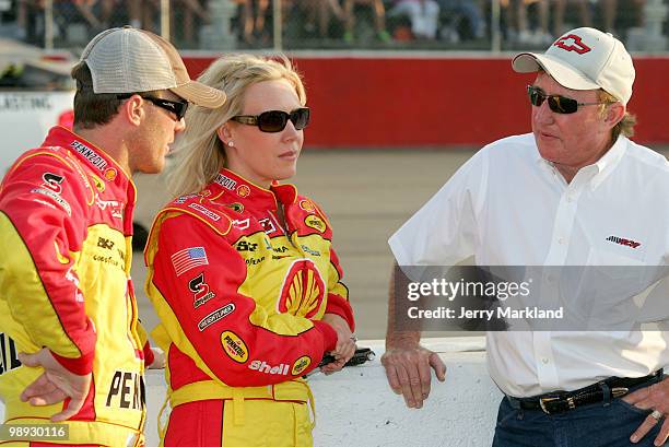 Kevin Harvick, driver of the Shell / Pennzoil Chevrolet, talks with his wife DeLana and team owner Richard Childress on the grid prior to the start...