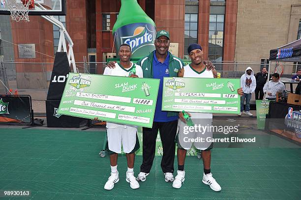 Legend Darryl Dawkins presents the winners of the Sprite Slam Dunk Contest with checks as part of the NBA Nation Mobile Basketball Tour on May 8,...
