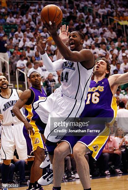 Miles of the Utah Jazz shoots over Pau Gasol of the Los Angeles Lakers during Game Three of the Western Conference Semifinals of the 2010 NBA...