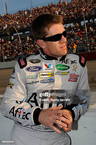Carl Edwards, driver of the Aflac Ford, looks on from the grid prior to thr start of the NASCAR Sprint Cup series SHOWTIME Southern 500 at Darlington...