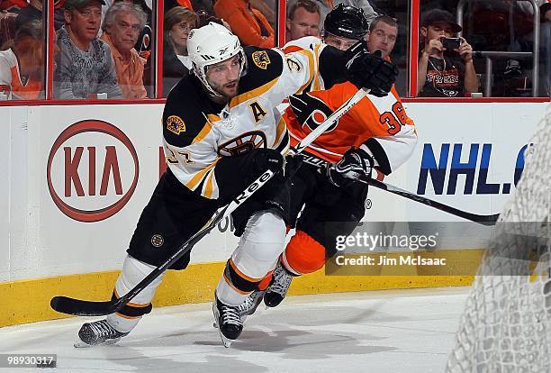 Patrice Bergeron of the Boston Bruins skates against the Philadelphia Flyers in Game Three of the Eastern Conference Semifinals during the 2010 NHL...