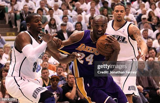 Kobe Bryant of the Los Angeles Lakers is defended by C.J. Miles of the Utah Jazz during Game Three of the Western Conference Semifinals of the 2010...