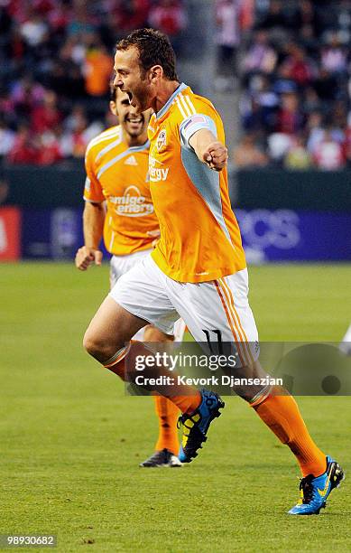Brad Davis of Houston Dynamo celebrates after scoring a goal against Chivas USA during the first half of the MLS soccer game on May 8, 2010 at the...