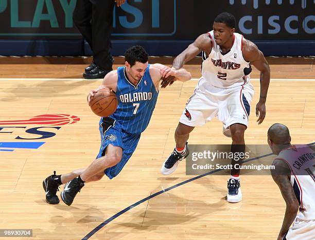 Redick of the Orlando Magic drives against Joe Johnson of the Atlanta Hawks in Game Three of the Eastern Conference Semifinals during the 2010 NBA...