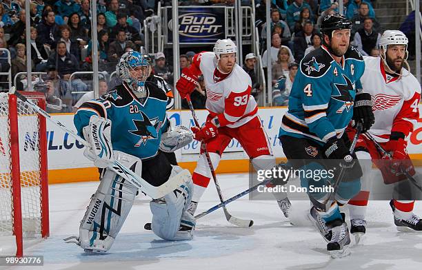 Johan Franzen and Todd Bertuzzi of the Detroit Red Wings look for the puck against Rob Blake and Evgeni Nabokov of the San Jose Sharks in Game Five...