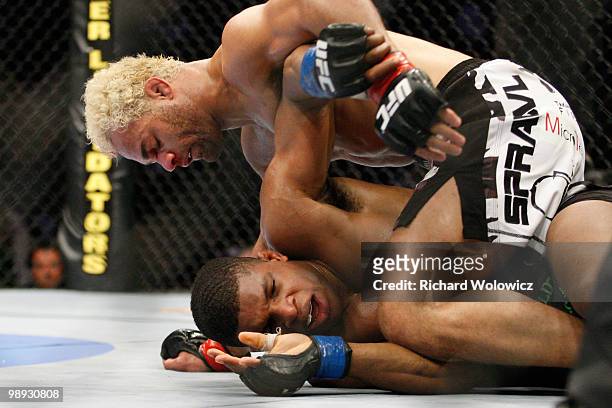Josh Koscheck stands on Paul Daley in their welter weight bout at UFC 113 at Bell Centre on May 8, 2010 in Montreal, Quebec, Canada.