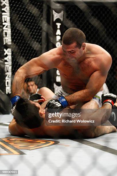 Mauricio "Shogun" Rua punches Lyoto Machida in their light heavyweight bout at UFC 113 at Bell Centre on May 8, 2010 in Montreal, Quebec, Canada.