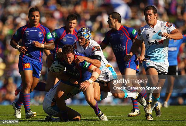 Kurt Gidley of the Knights is tackled during the round nine NRL match between the Newcastle Knights and the Gold Coast Titans at EnergyAustralia...