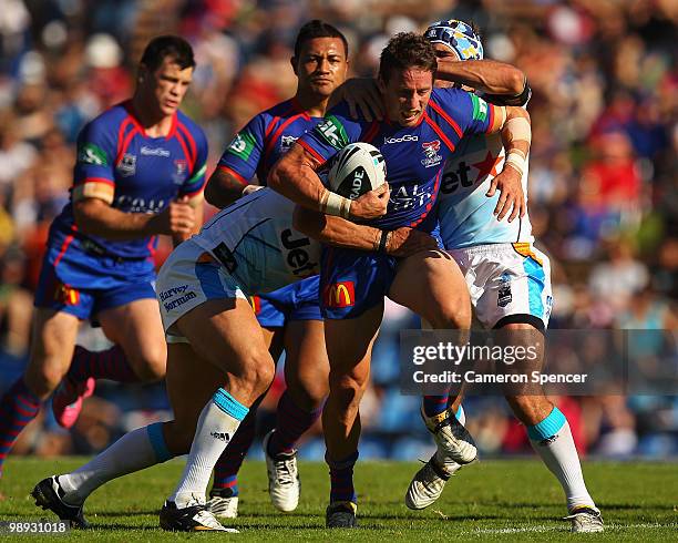 Kurt Gidley of the Knights is tackled during the round nine NRL match between the Newcastle Knights and the Gold Coast Titans at EnergyAustralia...