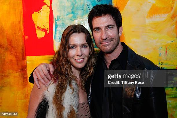 Charlotte Bjorlin Delia and actor Dylan McDermott pose at the AWOL Exhibit Opening Night Gala on May 8, 2010 in Venice, California.