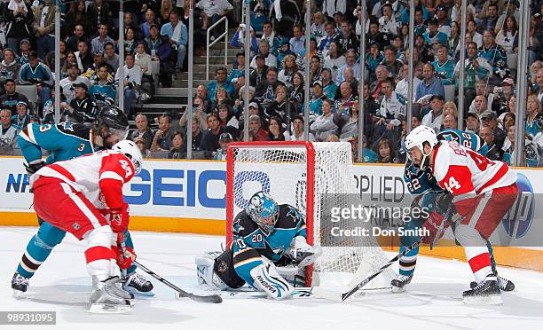 Henrik Zetterberg and Todd Bertuzzi of the Detroit Red Wings try to score against Evgeni Nabokov, Douglas Murray and Dan Boyle of the San Jose Sharks...