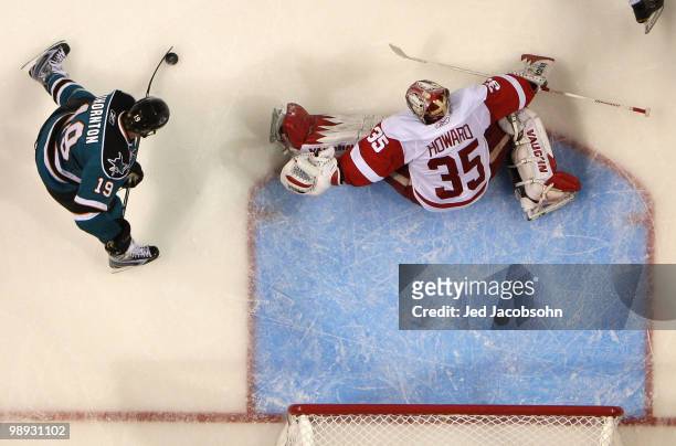 Joe Thornton of the San Jose Sharks scores against Jimmy Howard of the Detroit Red Wings in Game Five of the Western Conference Semifinals during the...