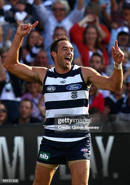 James Podsiadly of the Cats celebrates a goal during the round seven AFL match between the Geelong Cats and the Sydney Swans at Skilled Stadium on...