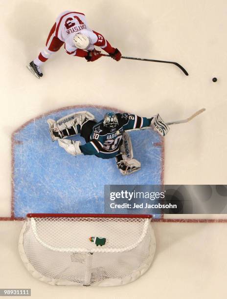 Evgeni Nabokov of the San Jose Sharks blocks a shot by Pavel Datsyuk of the Detroit Red Wings in Game Five of the Western Conference Semifinals...