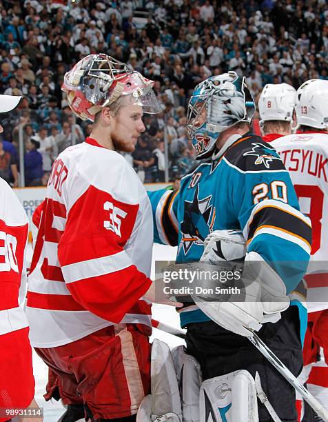 Jimmy Howard of the Detroit Red Wings shakes hands with Evgeni Nabokov of the San Jose Sharks after Game Five of the Western Conference Semifinals...