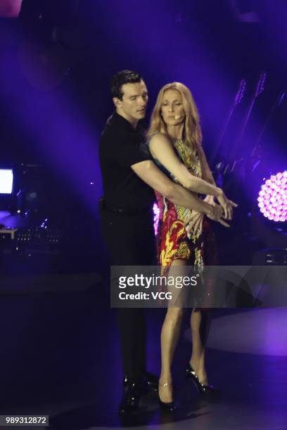 Canadian singer Celine Dion performs on the stage during 'Celine Dion Live 2018 in Macao' concert at the Venetian Macao’s Cotai Arena on June 29,...