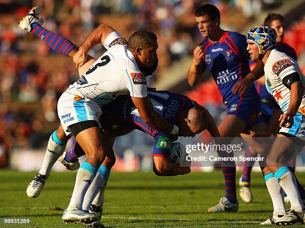 Matt Hilder of the Knights is tackled during the round nine NRL match between the Newcastle Knights and the Gold Coast Titans at EnergyAustralia...