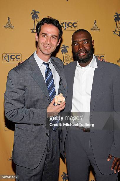 Israeli Consul General Jacob Dayan and director Antwone Fisher arrive at the Opening Night Gala for the 5th Annual Los Angeles Jewish Film Festival...